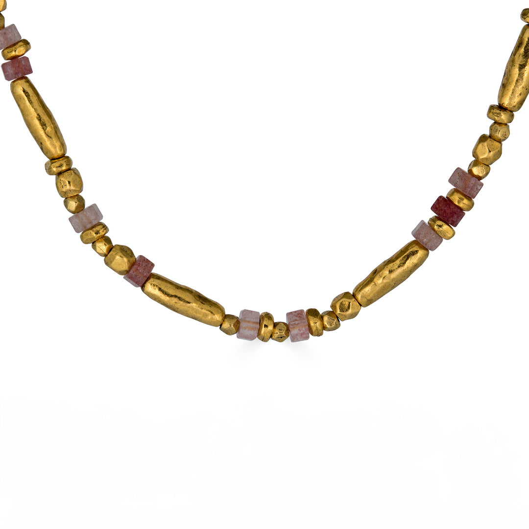 Necklace with pink strawberry quartz beads and organic gold-tone beads in an alternating organic pattern.