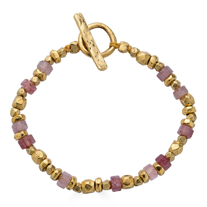 Pink strawberry quartz and gold bead bracelet with organic textured beads and toggle clasp.