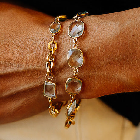 A quartz crystal bracelet with textured bezel edges