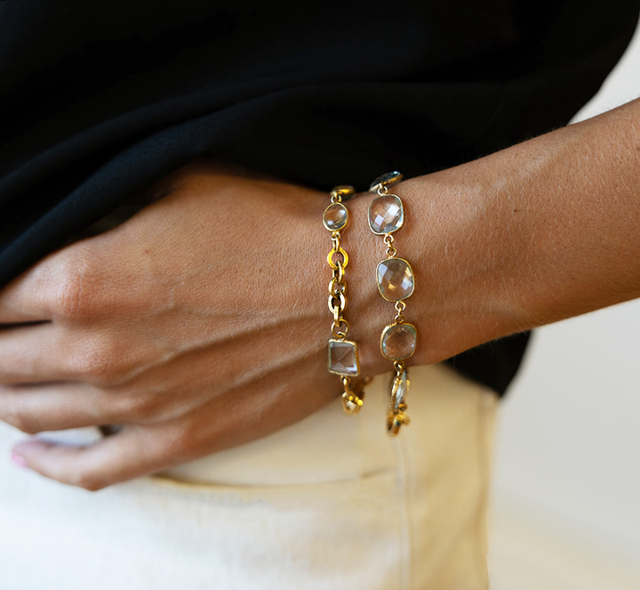 A quartz crystal bracelet with textured bezel edges