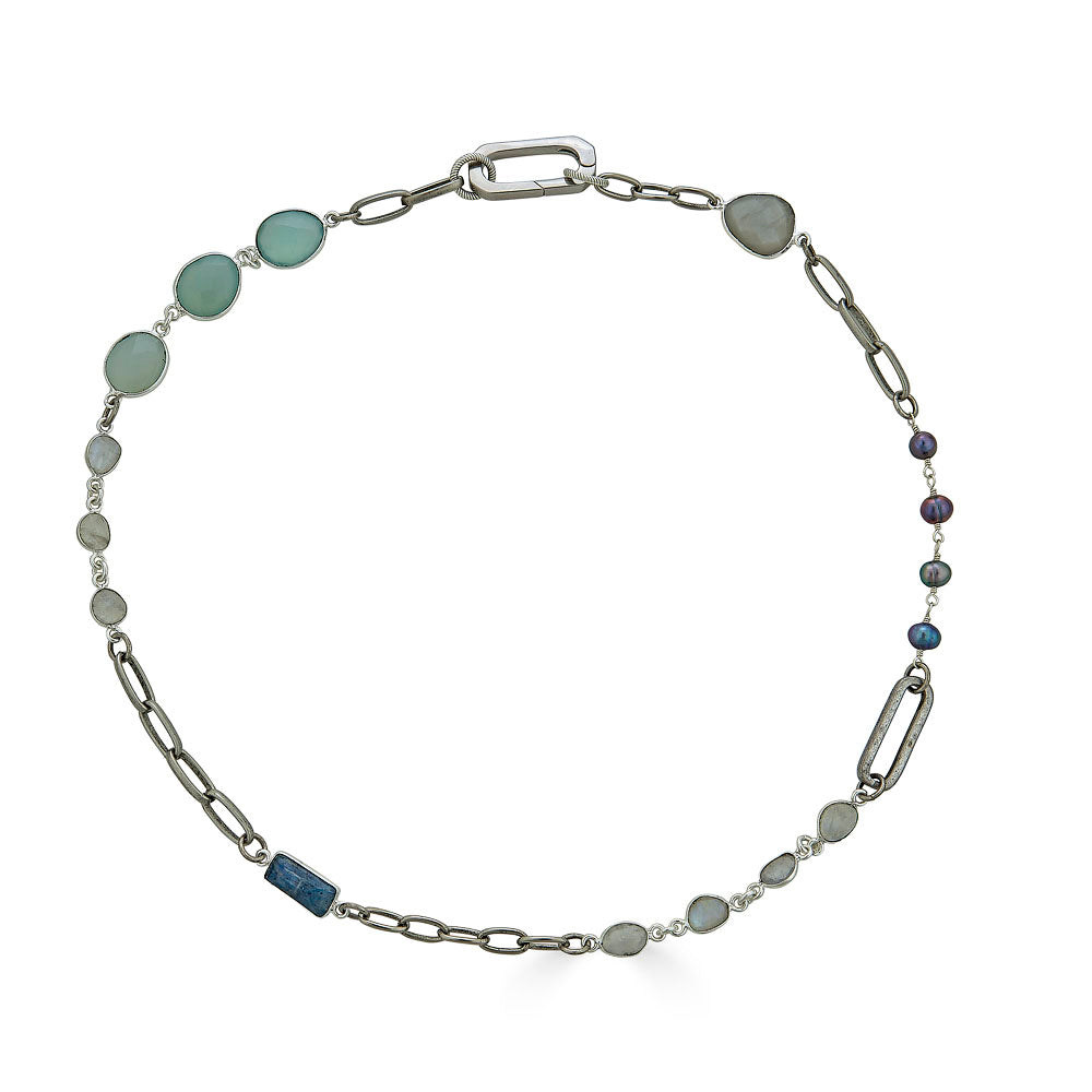 A silver mixed gemstone necklace with chalcedony, kyanite, moonstone and pearls.A chunky square link necklace.