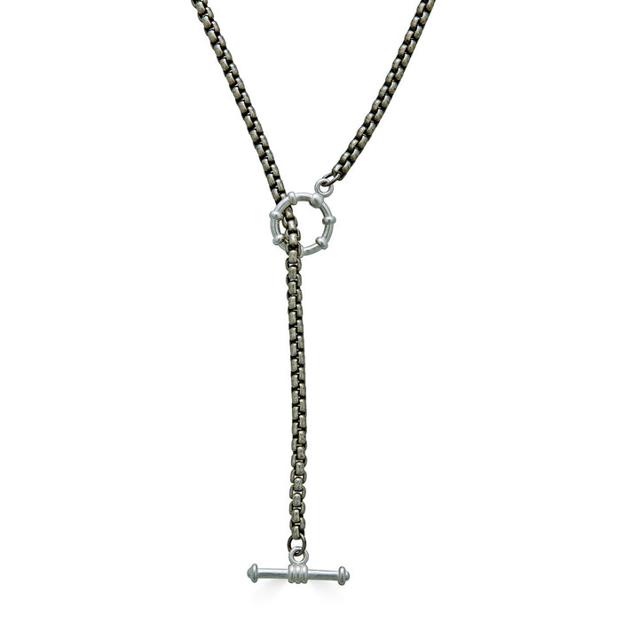 A silver venetian box chain lariat necklace.