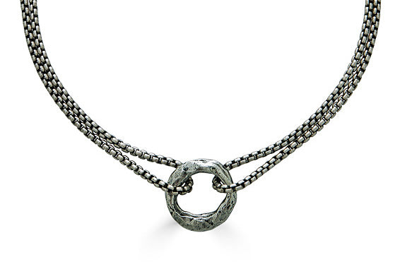 a matte silver two strand necklace with two hammered circles