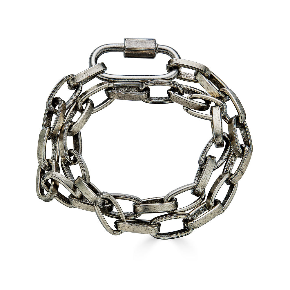 A chunky silver paperclip double wrap bracelet-necklace with carabiner link.