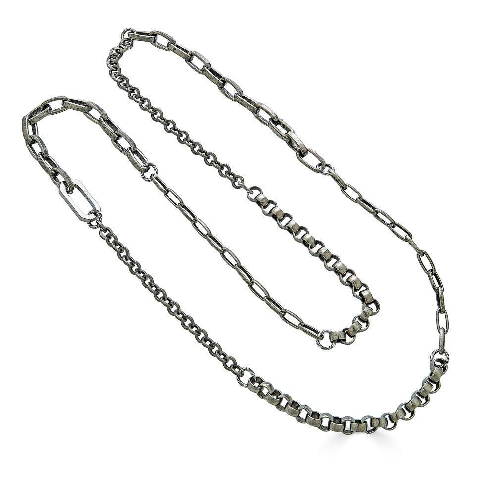 A silver four chain layering necklace.