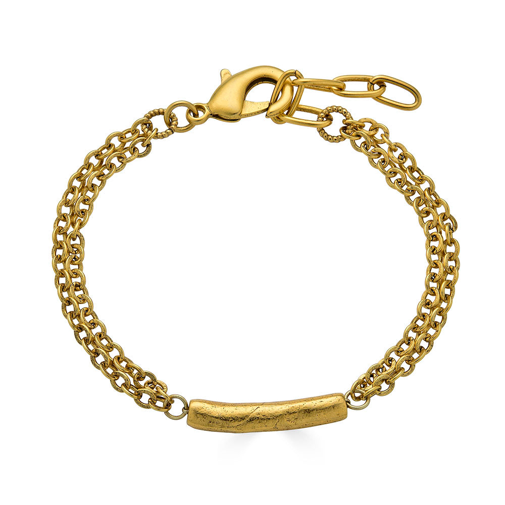 Gold bracelet with a single textured tube bead and double-strand chain.
