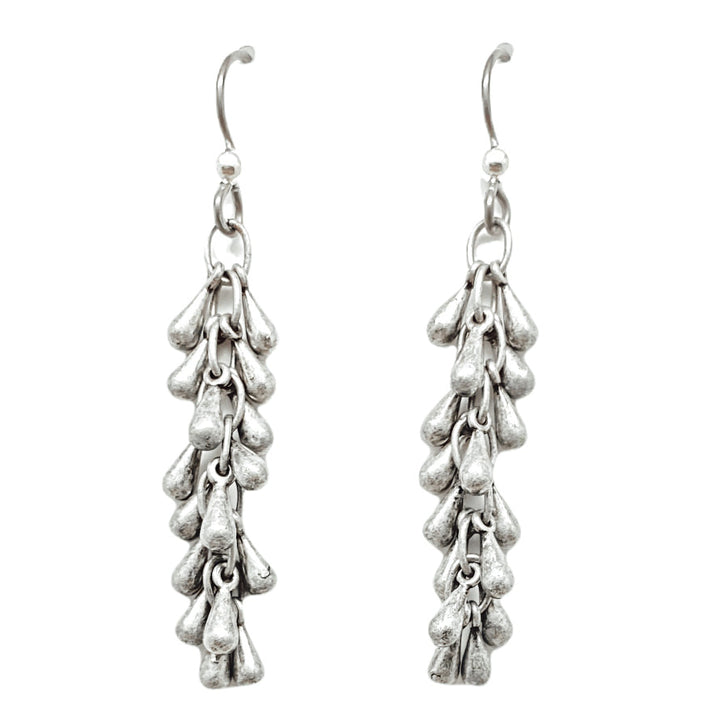 A pair of silver fireworks drop earrings.