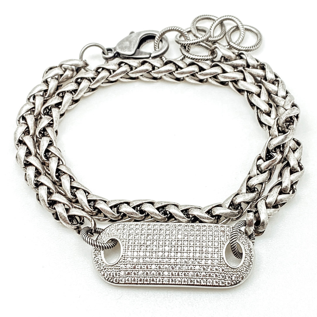 A double wrap silver chainlink bracelet with pave connector.