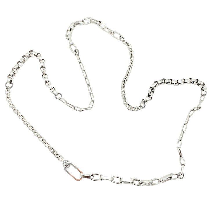 A silver four chain layering necklace.