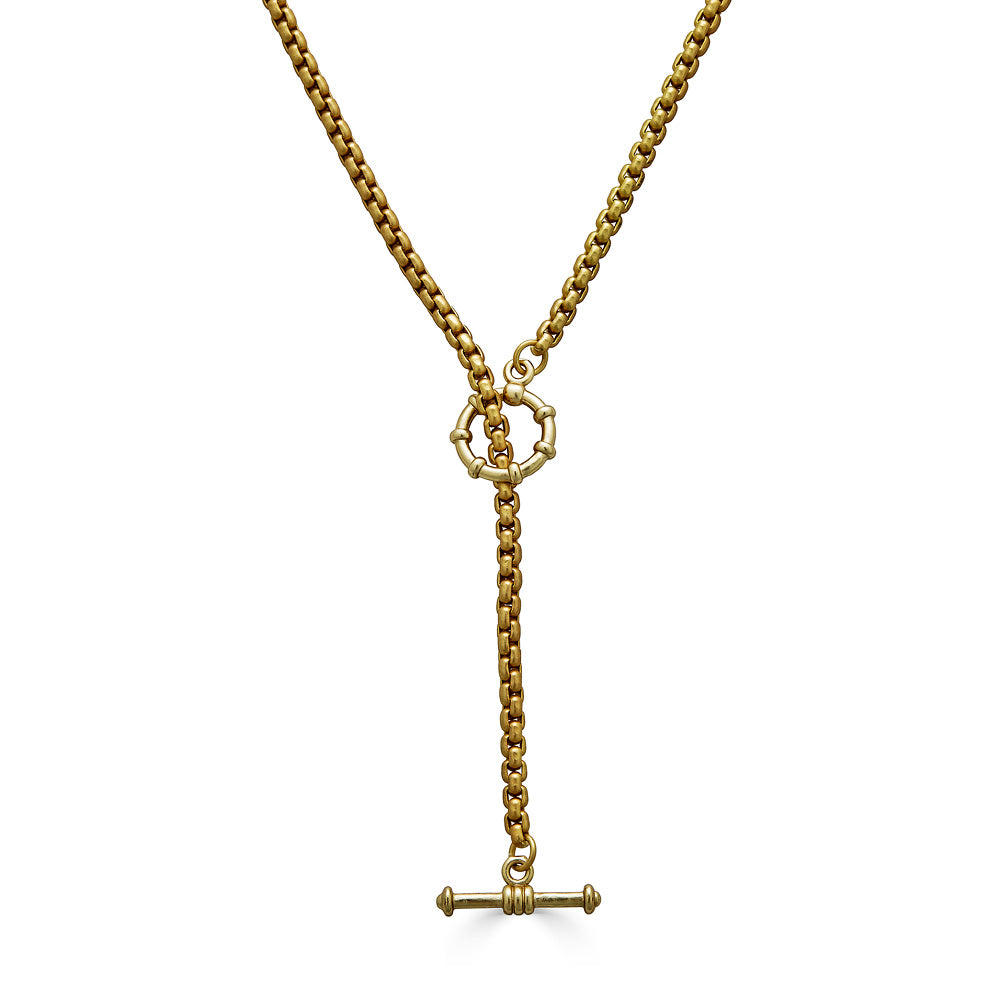 A gold venetian box chain lariat necklace.