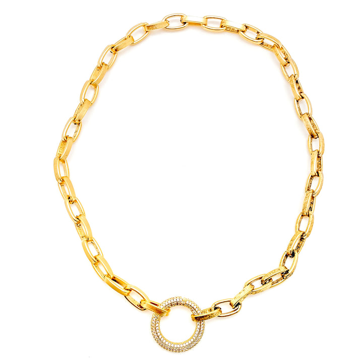 A thick gold paperclip necklace with a round pave carabiner link.