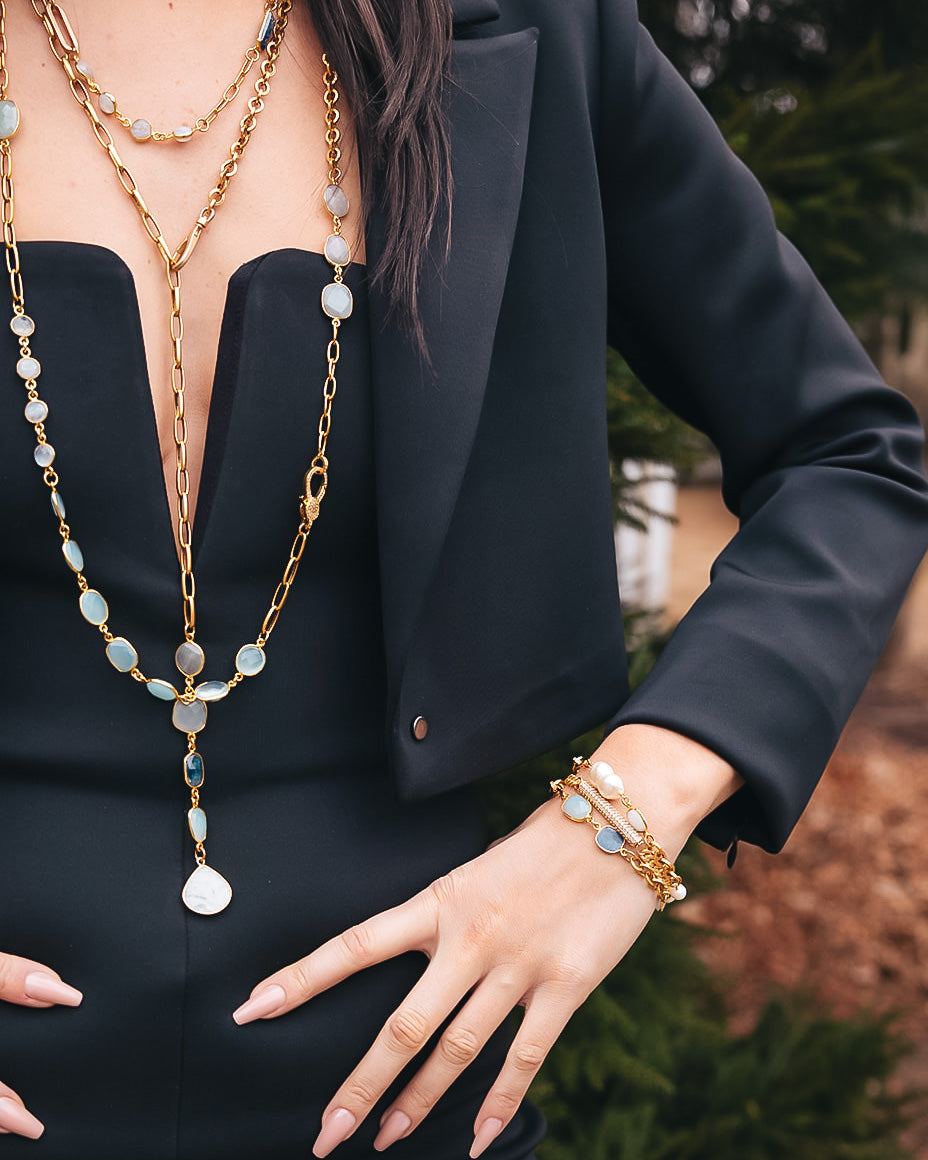 a long mixed gemstone necklace with kyanite, aquamarine and moonstone