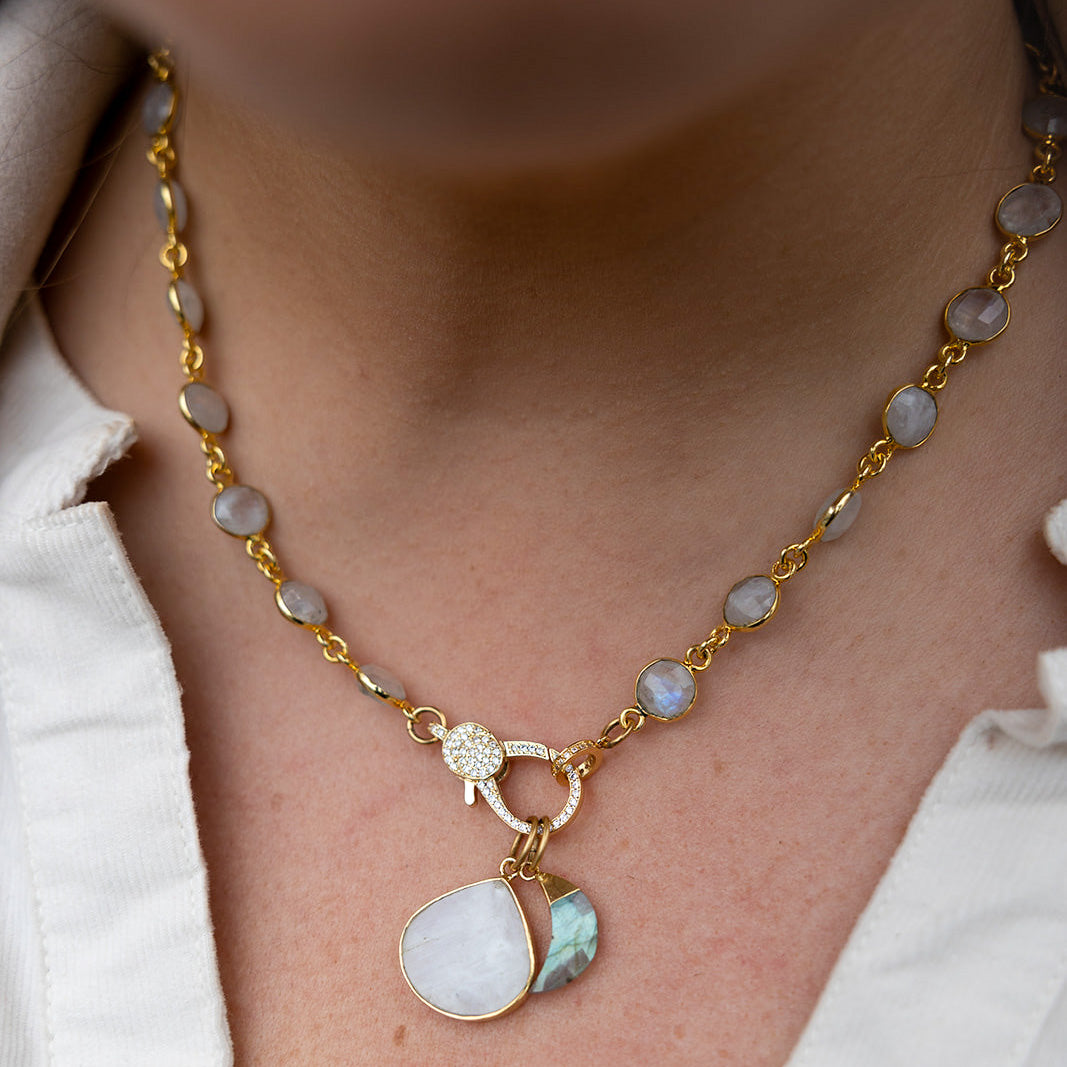 a moonstone necklace with labradorite moon