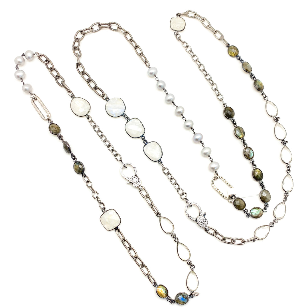 a mixed gemstone necklace with labradorite, pearls and moonstone