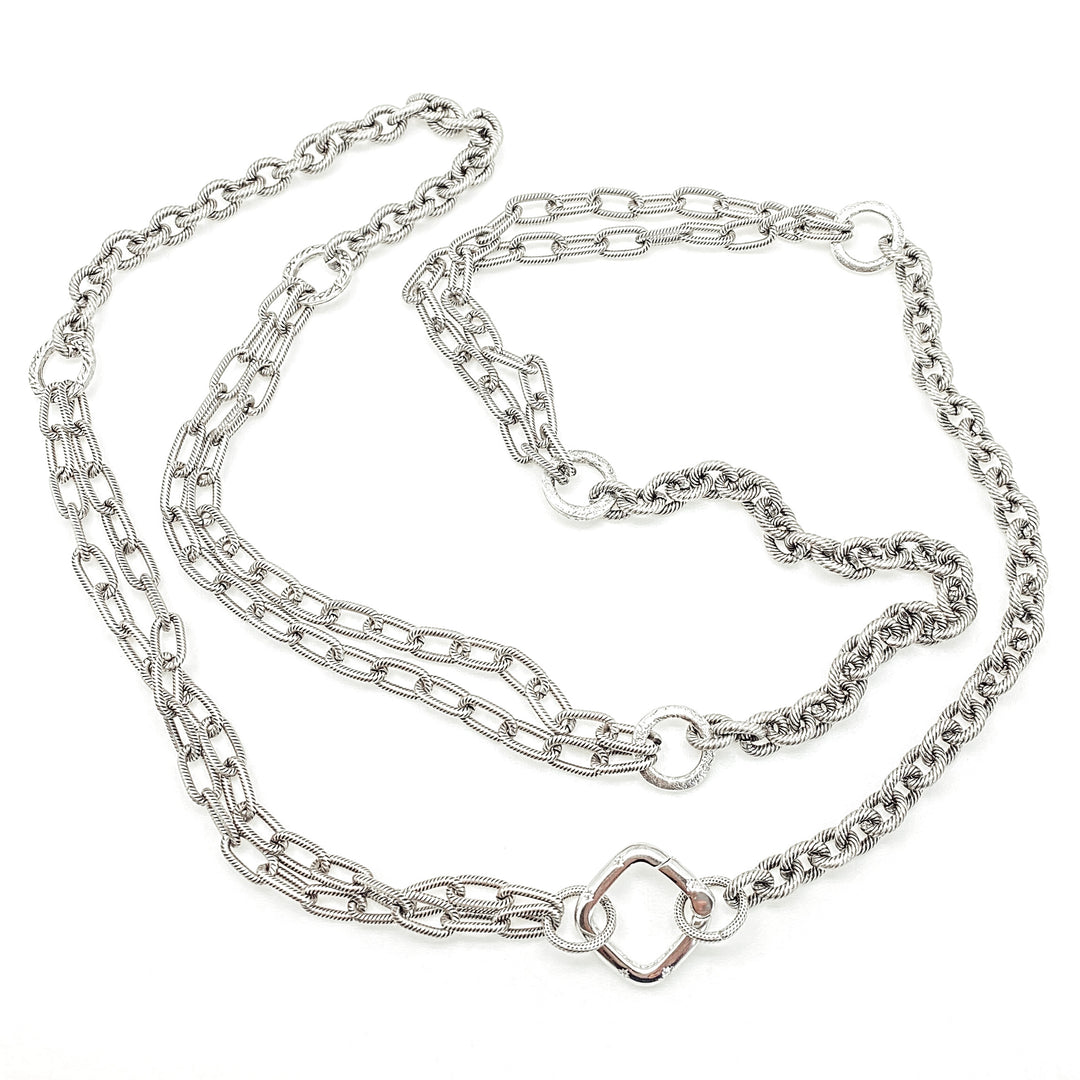 A silver multi-chain layering necklace with square clasp.