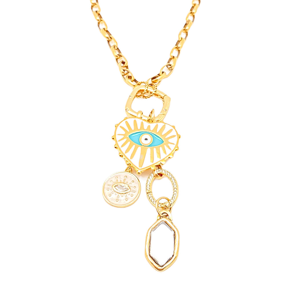 A third eye and marquis crystal charm gold necklace.